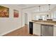 Modern kitchen features granite countertops and stainless steel appliances at 1214 E Curtis St, Tampa, FL 33603