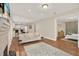Spacious living room with hardwood floors and bedroom view at 1214 E Curtis St, Tampa, FL 33603