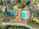 Community tennis court and pool area at 12218 Fox Chase Dr # G2, Hudson, FL 34669