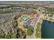 Community pool, tennis court, and lake at 12218 Fox Chase Dr # G2, Hudson, FL 34669