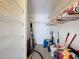 Large walk-in closet with wire shelving and hanging rods at 12218 Fox Chase Dr # G2, Hudson, FL 34669