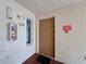 Condo entry with door, fire extinguisher, and alarm at 12218 Fox Chase Dr # G2, Hudson, FL 34669