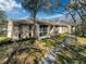 Condo building with screened balconies and walkway at 12218 Fox Chase Dr # G2, Hudson, FL 34669