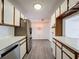 Clean and bright kitchen with ample cabinetry at 12218 Fox Chase Dr # G2, Hudson, FL 34669