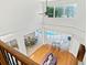 Living room with hardwood floors and a view of the pool at 12833 Darby Ridge Dr, Tampa, FL 33624