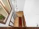 View of entryway from above, showing light wood floors and rug at 13032 Whisper Sound Dr, Tampa, FL 33618