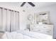 Bedroom with dresser and large mirror at 1398 Shady Pine Way # E3, Tarpon Springs, FL 34688