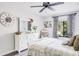 Bright bedroom with a comfortable bed and plenty of storage at 1398 Shady Pine Way # E3, Tarpon Springs, FL 34688
