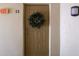 Condo entry door with a decorative wreath at 1398 Shady Pine Way # E3, Tarpon Springs, FL 34688