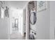 Stackable washer and dryer in a closet at 1398 Shady Pine Way # E3, Tarpon Springs, FL 34688