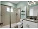 Clean bathroom with walk-in shower and granite countertop at 14214 Quintessa Ln, Lithia, FL 33547