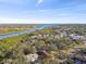 Wide aerial view of the property and surrounding area at 1455 Briarwood Ct, Safety Harbor, FL 34695