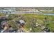 Aerial view showcasing home's location near water at 1455 Briarwood Ct, Safety Harbor, FL 34695