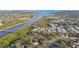Aerial view of neighborhood near water at 1455 Briarwood Ct, Safety Harbor, FL 34695