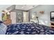 Spacious bedroom with a double bed and access to a hallway at 1455 Briarwood Ct, Safety Harbor, FL 34695