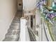 Bright entryway with staircase, tile flooring, and decorative wreath at 1455 Briarwood Ct, Safety Harbor, FL 34695