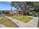 Home exterior view, showcasing curb appeal and landscaping at 1455 Briarwood Ct, Safety Harbor, FL 34695