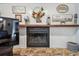 Stone fireplace with decorative mantel and shelving at 1455 Briarwood Ct, Safety Harbor, FL 34695