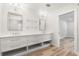 Bathroom with double vanity and modern light fixtures at 280 N Julia Cir, St Pete Beach, FL 33706