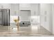 Modern kitchen with stainless steel appliances, a white subway tile backsplash, and a stone countertop at 280 N Julia Cir, St Pete Beach, FL 33706