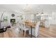 A bright living room with a modern fireplace and lots of natural light at 280 N Julia Cir, St Pete Beach, FL 33706