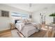 A bright main bedroom with lots of natural light at 280 N Julia Cir, St Pete Beach, FL 33706