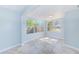 Sunroom with multiple windows and tile floors at 2921 24Th S Ave, St Petersburg, FL 33712