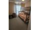 Bedroom with bunk beds and window coverings at 30119 Wellesley Way, Wesley Chapel, FL 33543