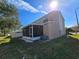 Two-story home with screened patio at 30119 Wellesley Way, Wesley Chapel, FL 33543