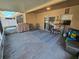 Screened patio with grill and outdoor furniture at 30119 Wellesley Way, Wesley Chapel, FL 33543