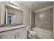 Bathroom with granite countertops and a bathtub at 31424 Amberview Bend, Wesley Chapel, FL 33545