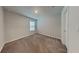 Simple bedroom with neutral walls and carpeted floors at 31424 Amberview Bend, Wesley Chapel, FL 33545