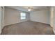 Simple bedroom with neutral walls and carpeted floors at 31424 Amberview Bend, Wesley Chapel, FL 33545