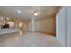 Spacious living room with tile floors and a ceiling fan at 31424 Amberview Bend, Wesley Chapel, FL 33545