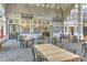 Clubhouse dining area with tables, chairs, and large windows at 3320 Stonebridge Trl, Valrico, FL 33596