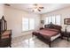 Spacious bedroom with tiled floors and a large bed at 3391 Knox Ter, Port Charlotte, FL 33948