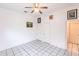 Simple bedroom with tiled floors and multiple closets at 3391 Knox Ter, Port Charlotte, FL 33948
