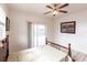 Bedroom with sliding door access to the pool area at 3391 Knox Ter, Port Charlotte, FL 33948