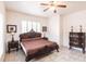 Elegant bedroom featuring a large ornate bed and tiled floors at 3391 Knox Ter, Port Charlotte, FL 33948