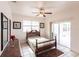 Cozy bedroom with tiled floors and access to a patio at 3391 Knox Ter, Port Charlotte, FL 33948