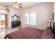 Bright bedroom with tiled floors and access to a bathroom at 3391 Knox Ter, Port Charlotte, FL 33948