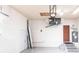Garage with an additional door and HVAC unit at 3391 Knox Ter, Port Charlotte, FL 33948