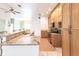 Open kitchen with granite countertops and stainless steel appliances at 3391 Knox Ter, Port Charlotte, FL 33948