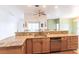 Kitchen with granite countertops, island, and stainless steel appliances at 3391 Knox Ter, Port Charlotte, FL 33948