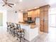Kitchen with granite countertops, stainless steel appliances, and light wood cabinets at 3391 Knox Ter, Port Charlotte, FL 33948