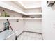 Laundry room with shelving and a utility sink at 3391 Knox Ter, Port Charlotte, FL 33948