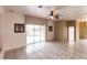 Living area with sliding glass doors leading to a pool and patio area at 3391 Knox Ter, Port Charlotte, FL 33948