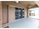 Covered patio with sliding doors to pool and screened enclosure at 3391 Knox Ter, Port Charlotte, FL 33948