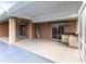 Covered patio with outdoor kitchen and pool access at 3391 Knox Ter, Port Charlotte, FL 33948