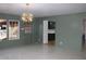 Modern dining room with access to kitchen and a view of the backyard at 36847 Jefferson Ave, Dade City, FL 33523